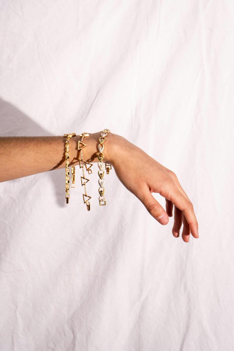 Gold bracelets on the hand